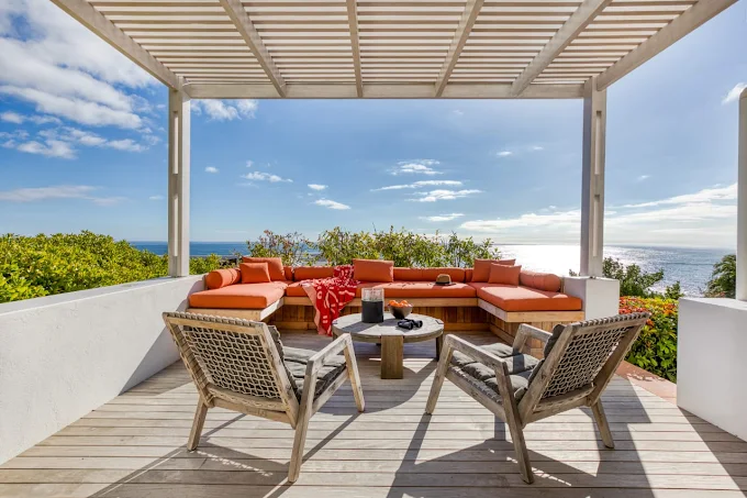 Natural silver-grey weathered hardwood decking by Cape Town Timber Decking, ideal for low-maintenance coastal luxury.